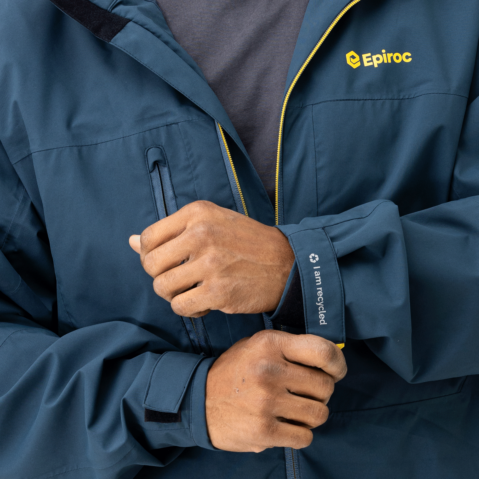 rain jacket with epiroc logo close up on arm